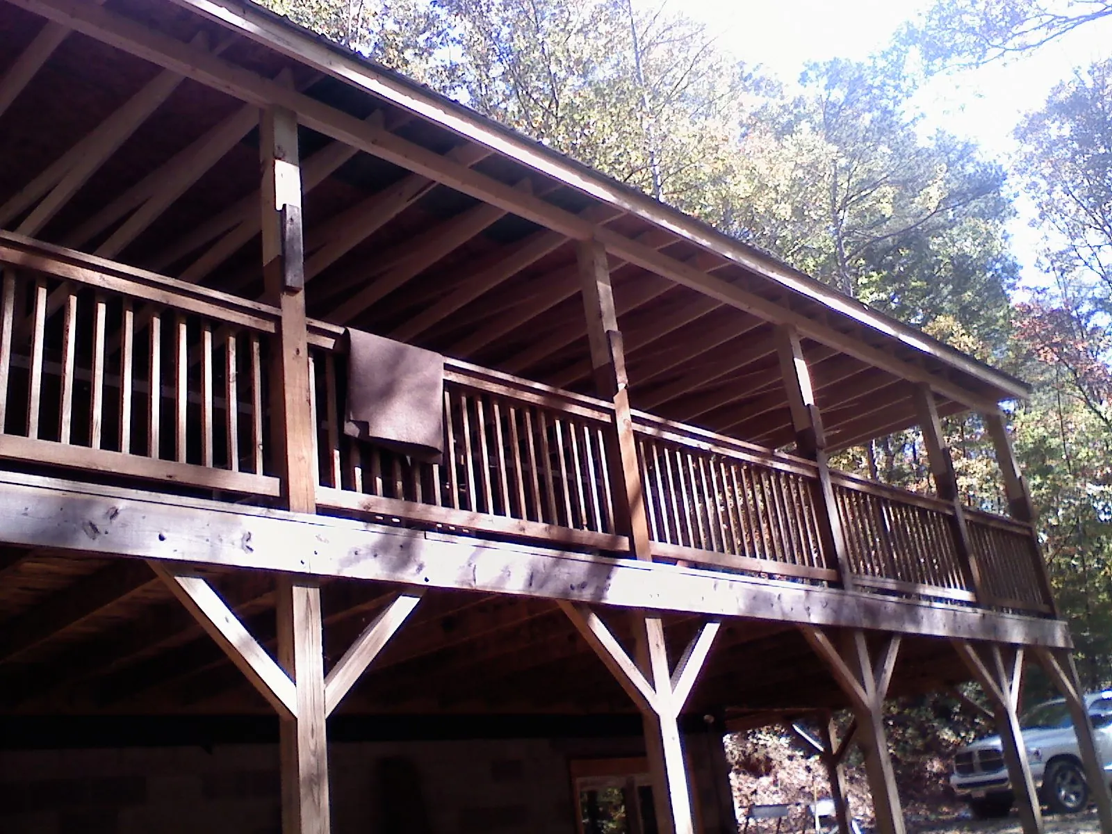 Timber framing under a new elevated porch and deck — Roof Leak Repair in Hudson by Roofing Brothers